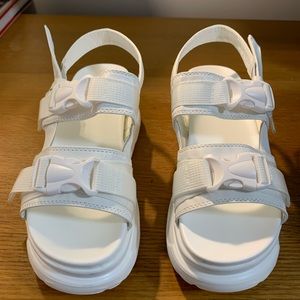 Chunky white platform sandals with double buckle